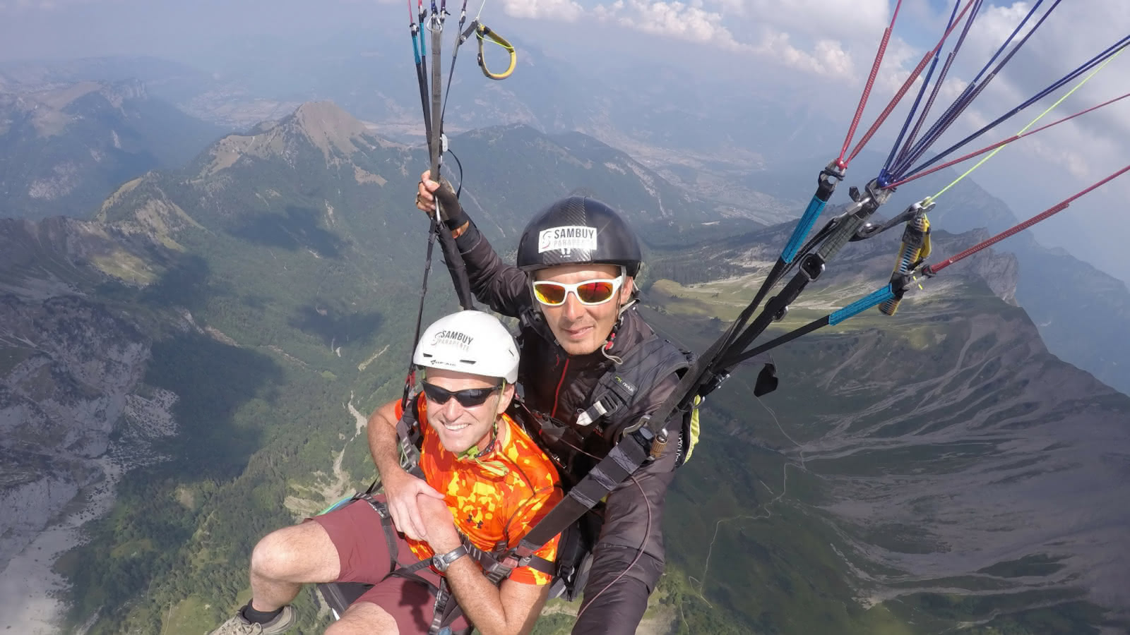 paragliding flight above the mountains